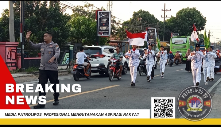 Peran Aktif Anggota Polsek Sumberasih Dalam Pengamanan Drumband Di Acara Imtihan TPQ Wali Songo Desa Laweyan